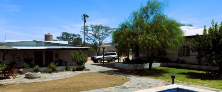 Garden, terrace and pool corner at Little Bush Guesthouse
