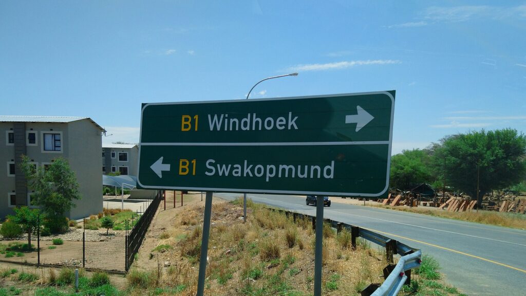 Windhoek Etosha Sossusvlei itinerary with red dunes and a self-drive vehicle