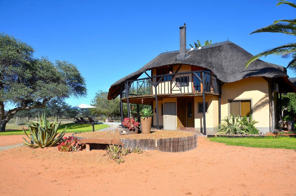 Lodge vs guest farm near Etosha comparison illustrated by a traditional Namibian guest farm