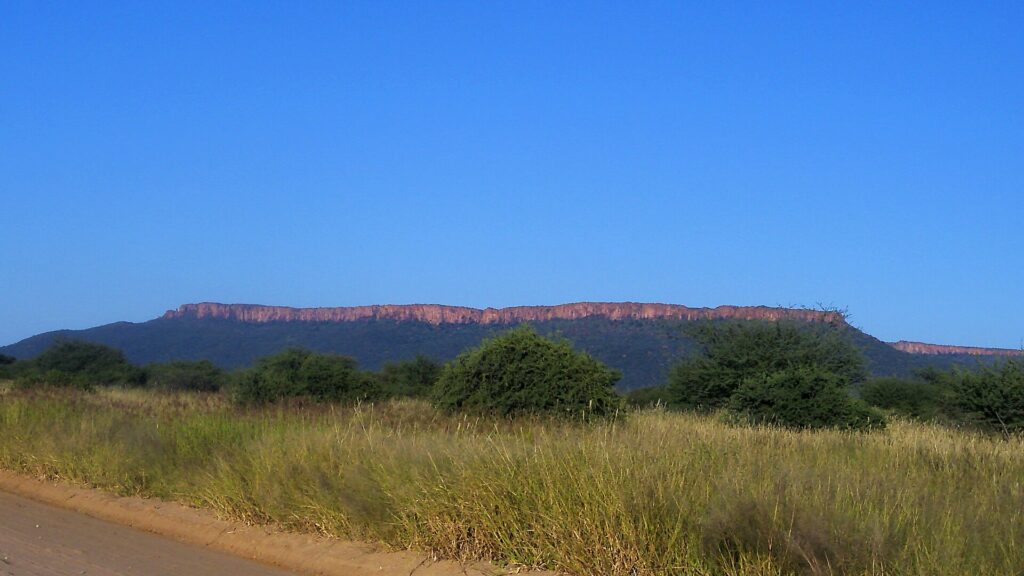 Etosha and Waterberg circuit represented by the red sandstone escarpment of Waterberg Plateau